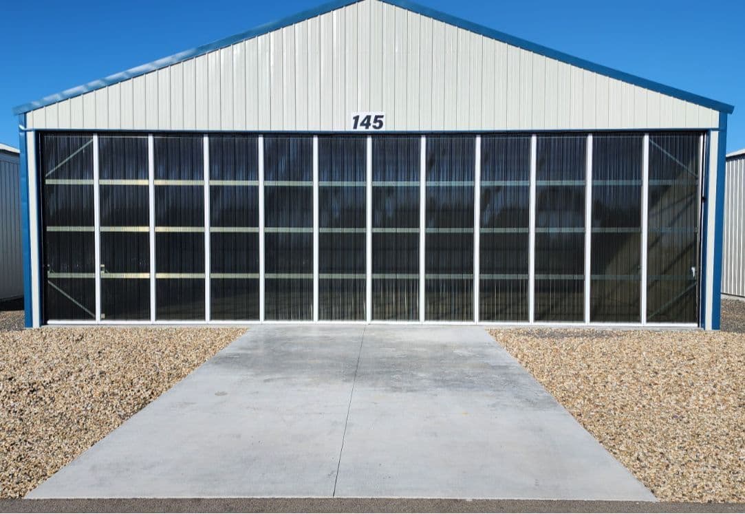 Newly built hangar 42x30 Manual double cantelever doors with tinted glass 4