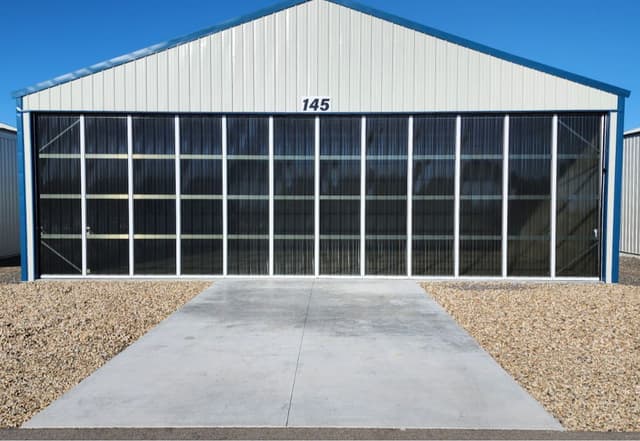 Newly built hangar 42x30 Manual double cantelever doors with tinted glass 3